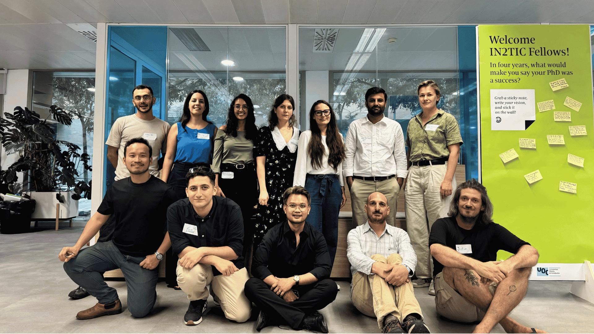Group photo of the twelve researchers during the Welcome Day event held this October (UOC)