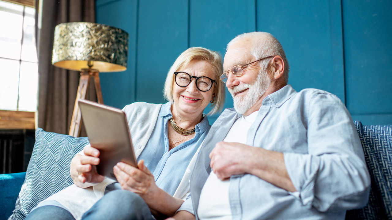 older couple with tablet