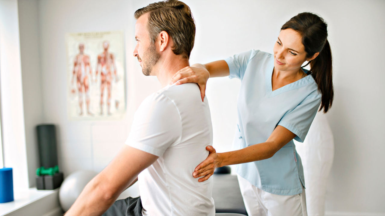 physiotherapist with a patient
