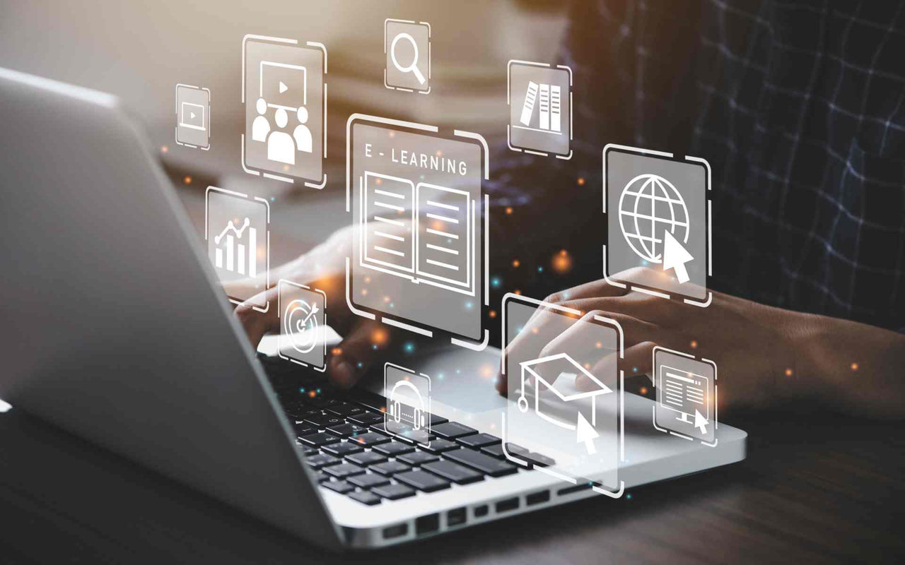 computer with elearning icons