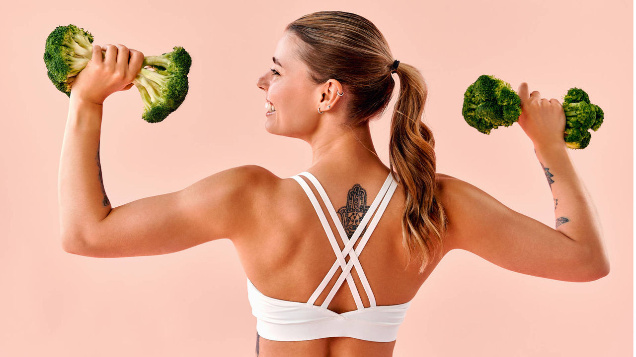 desportista con brócoli